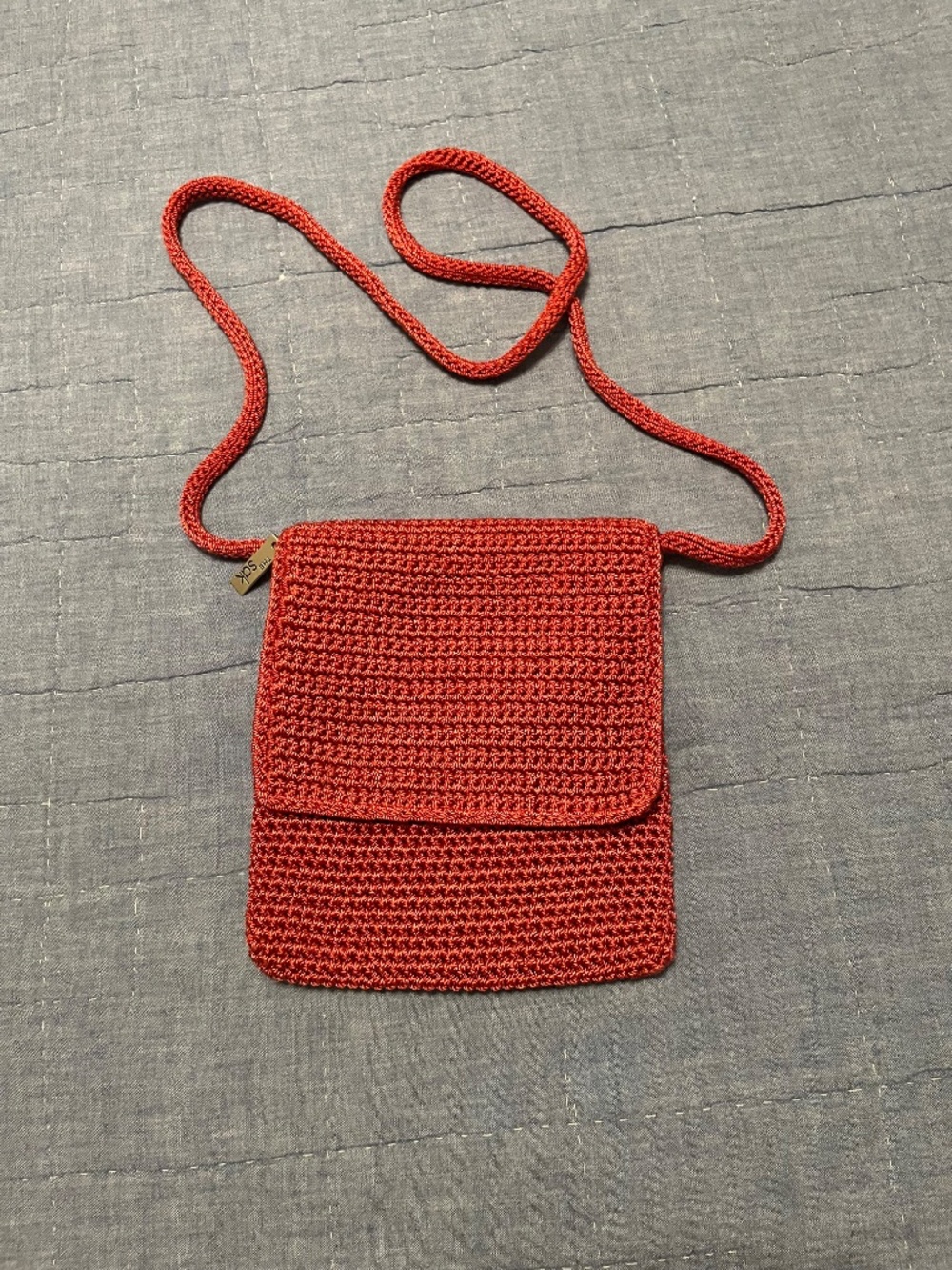 The SAK Dusty Rose Red Crochet Knit Boho Y2K Crossbody Purse Bag with Charm